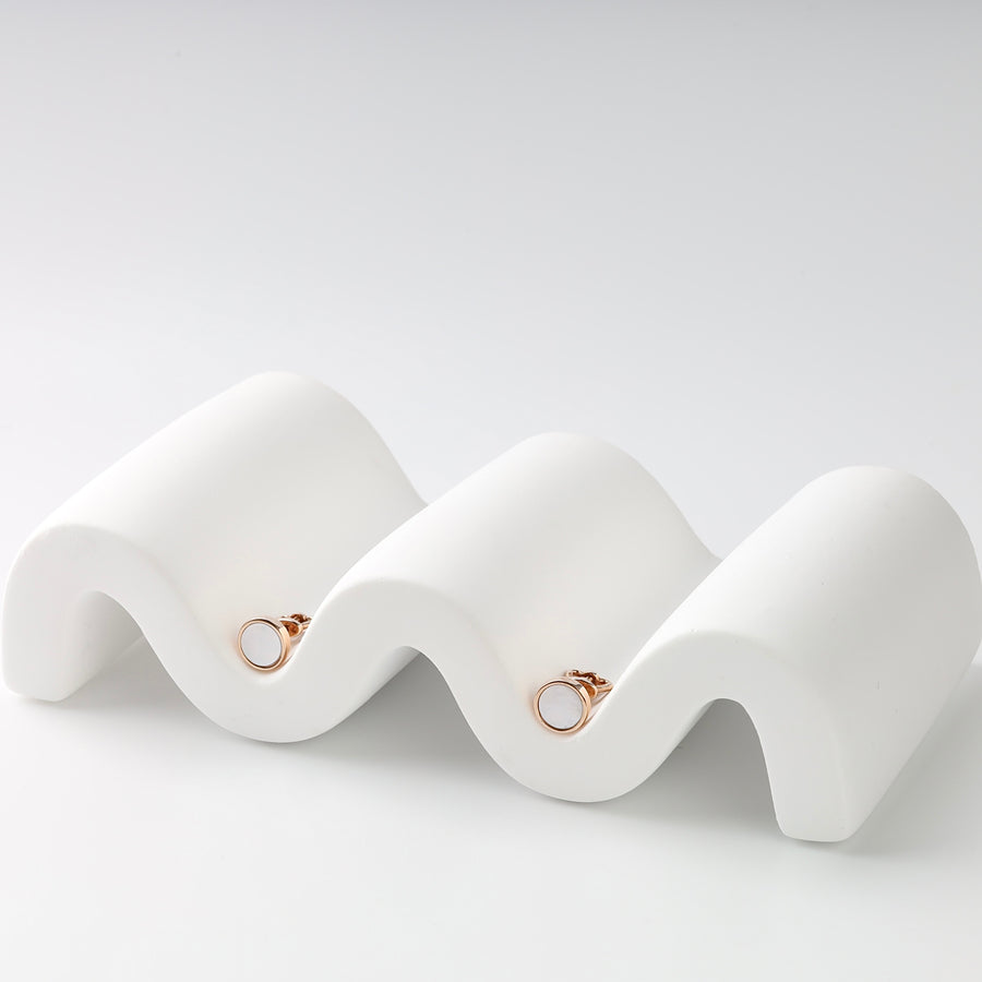 Round Mother of Pearl Stud Earrings in 14K Rose Gold — pair on white background