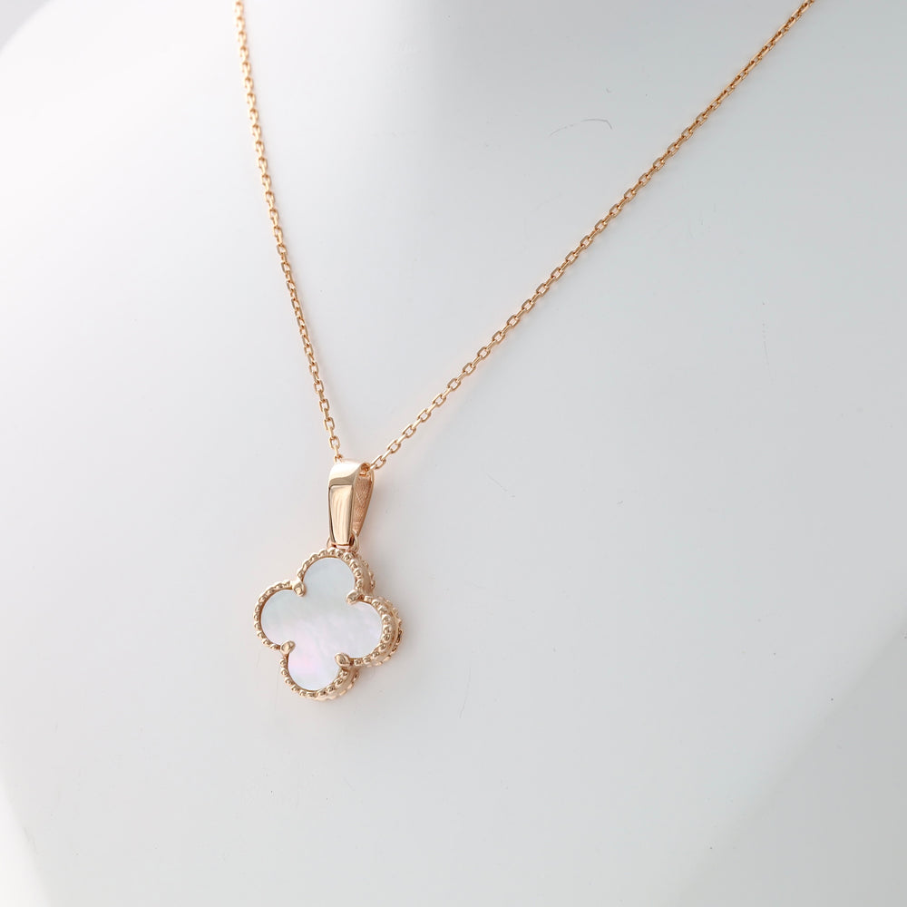 Clover Mother of Pearl Pendant Necklace in 14K Rose Gold — close-up of pendant iridescent pearl