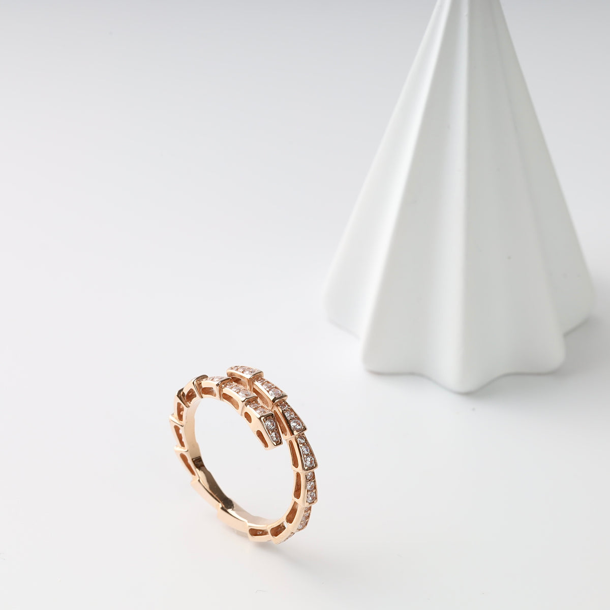 Serpenti Wrap Ring with CZ in 14K Rose Gold — worn on finger