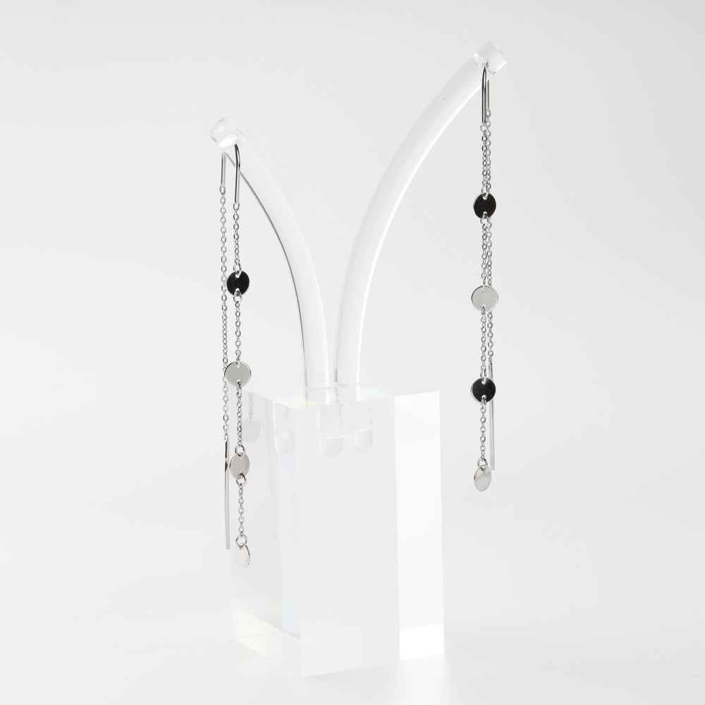 White gold disc threader earrings on display Ukrainian Jewelry