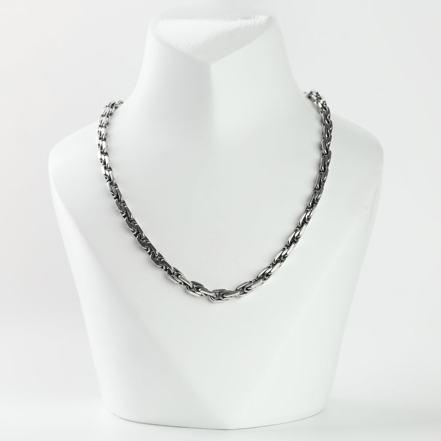 Silver 925 anchor link chain necklace for men on a display bust