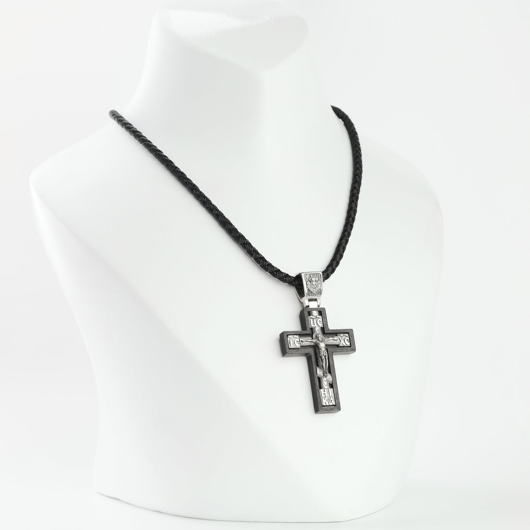 Ebony cross pendant with sterling silver crucifix overlay, front view