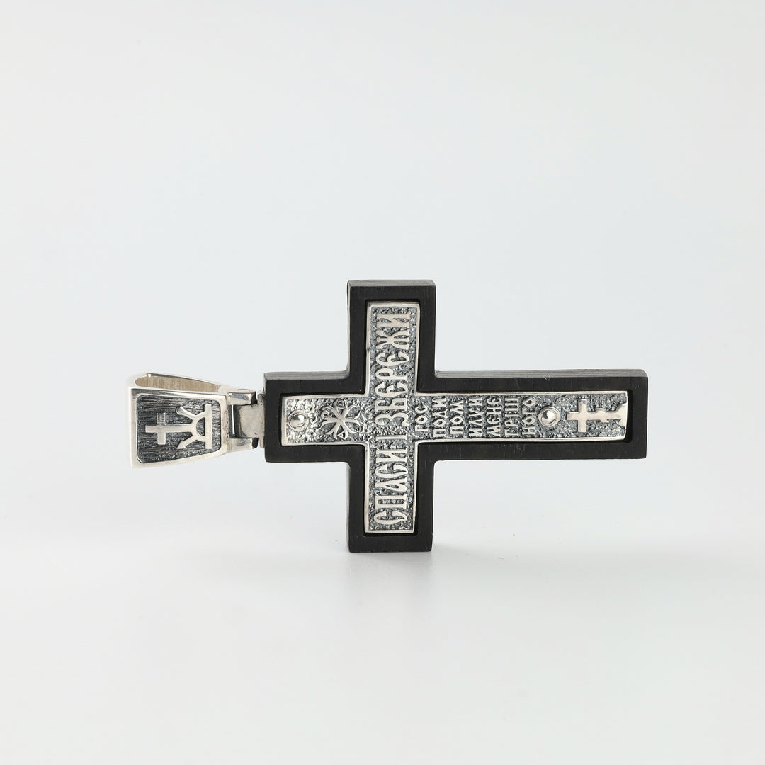 Wooden cross pendant with silver crucifix, side detail