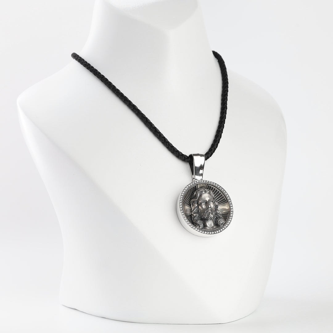 Jesus Christ silver medallion pendant with cubic zirconia halo