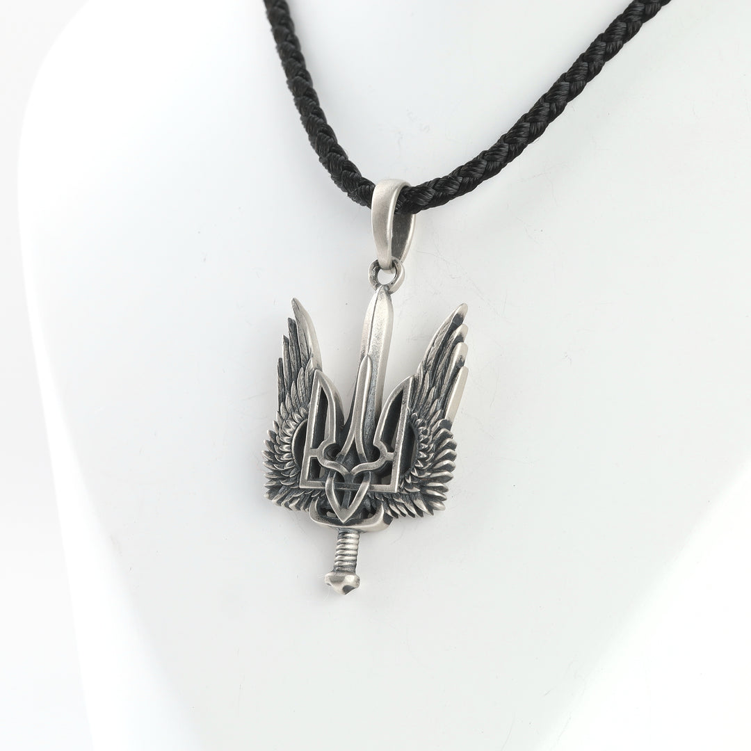Oxidized silver Tryzub pendant detail with feathered wings