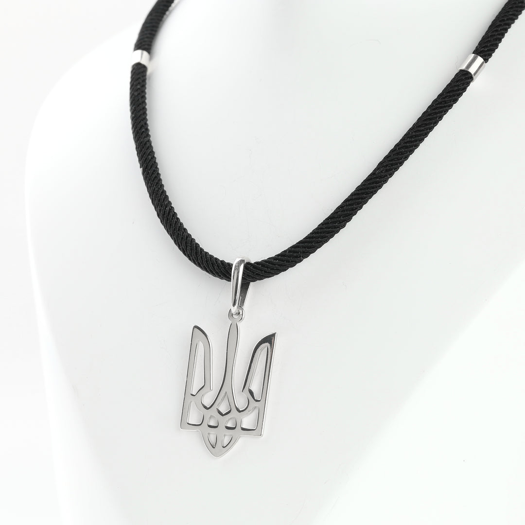 Polished Silver 925 openwork Tryzub pendant, close-up