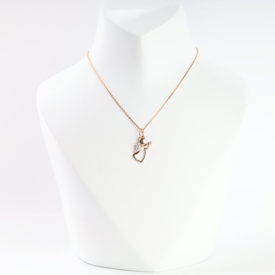 14K rose gold angel pendant with cubic zirconia on a thin chain