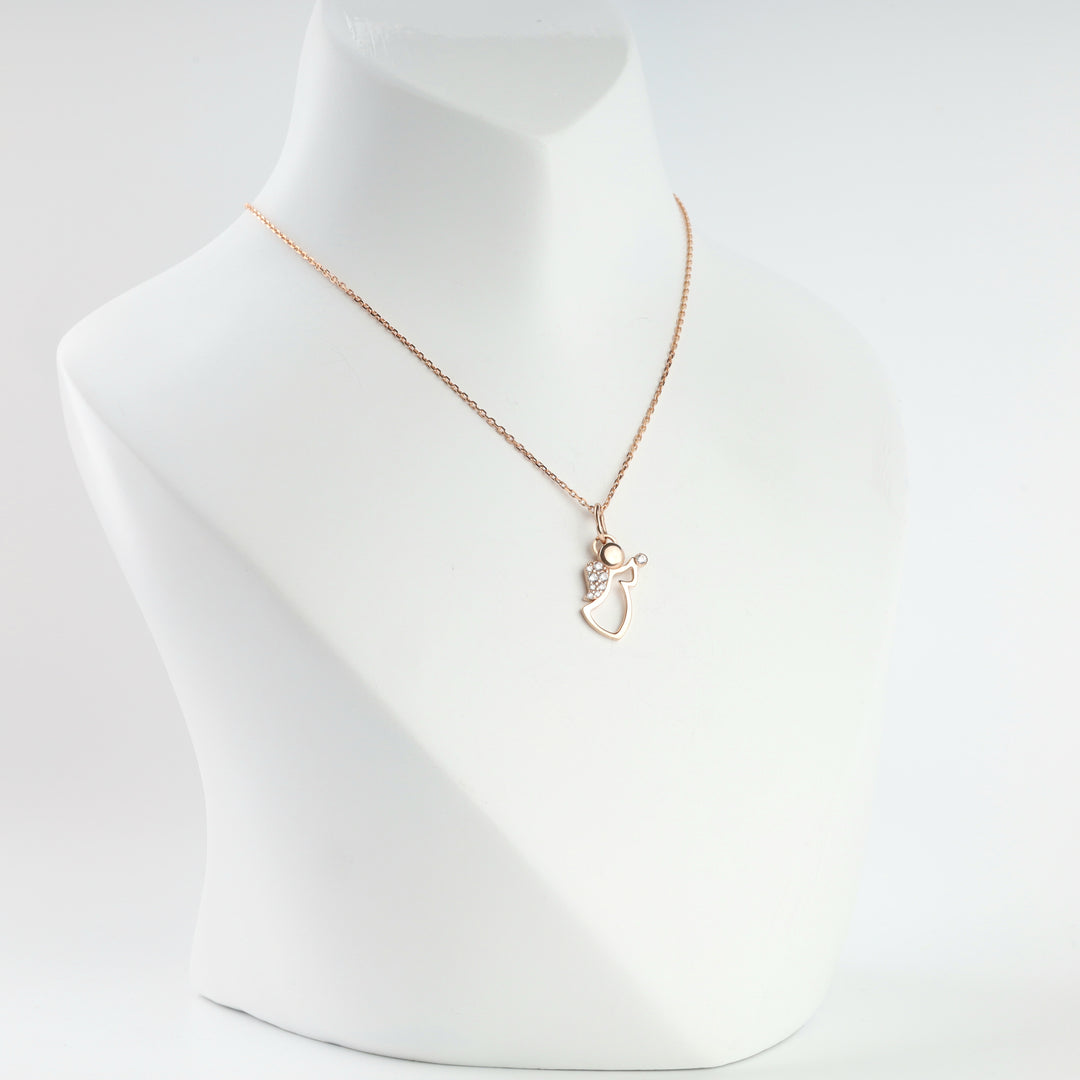 Rose gold angel pendant close-up