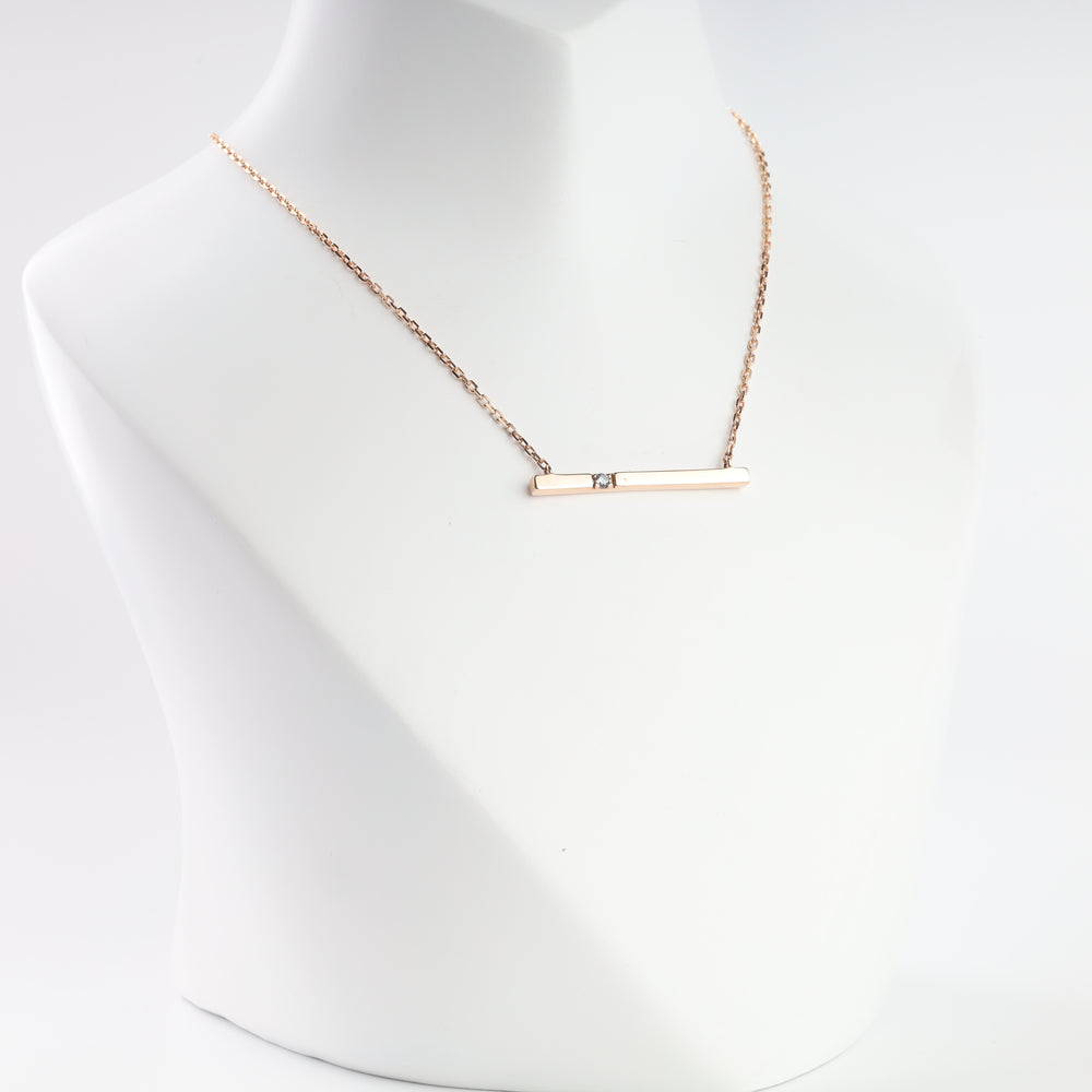 Rose gold 585 bar necklace with central cubic zirconia