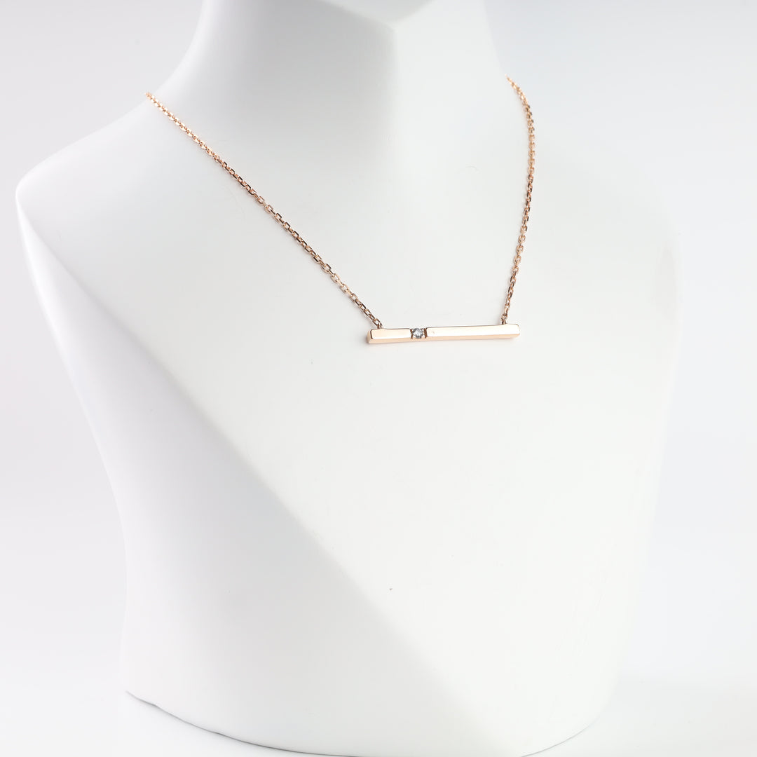 Rose gold 585 bar necklace with central cubic zirconia