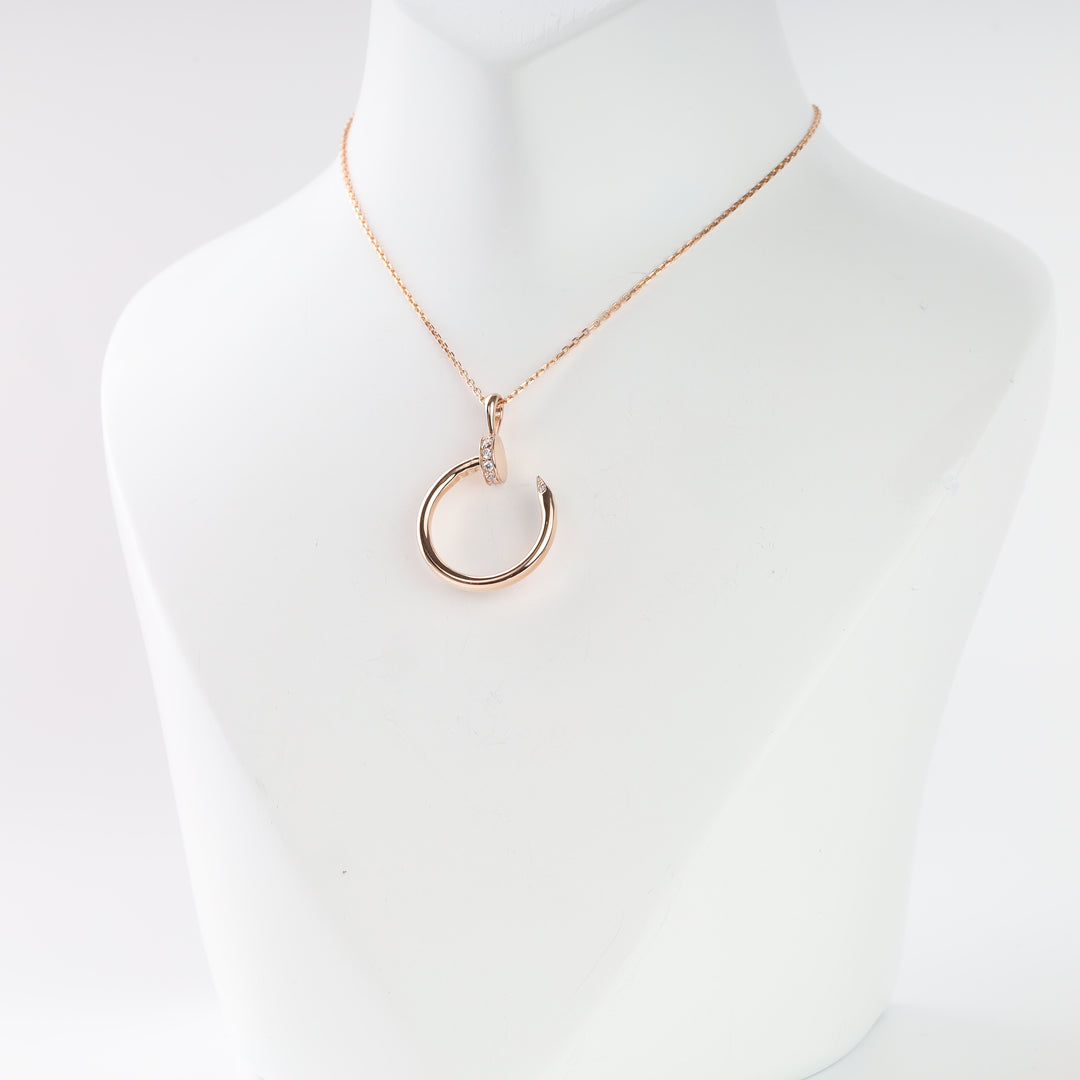 14K (585) rose gold nail circle pendant close-up