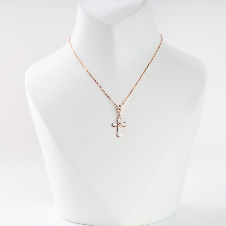 14K rose gold cross pendant with white enamel on a chain