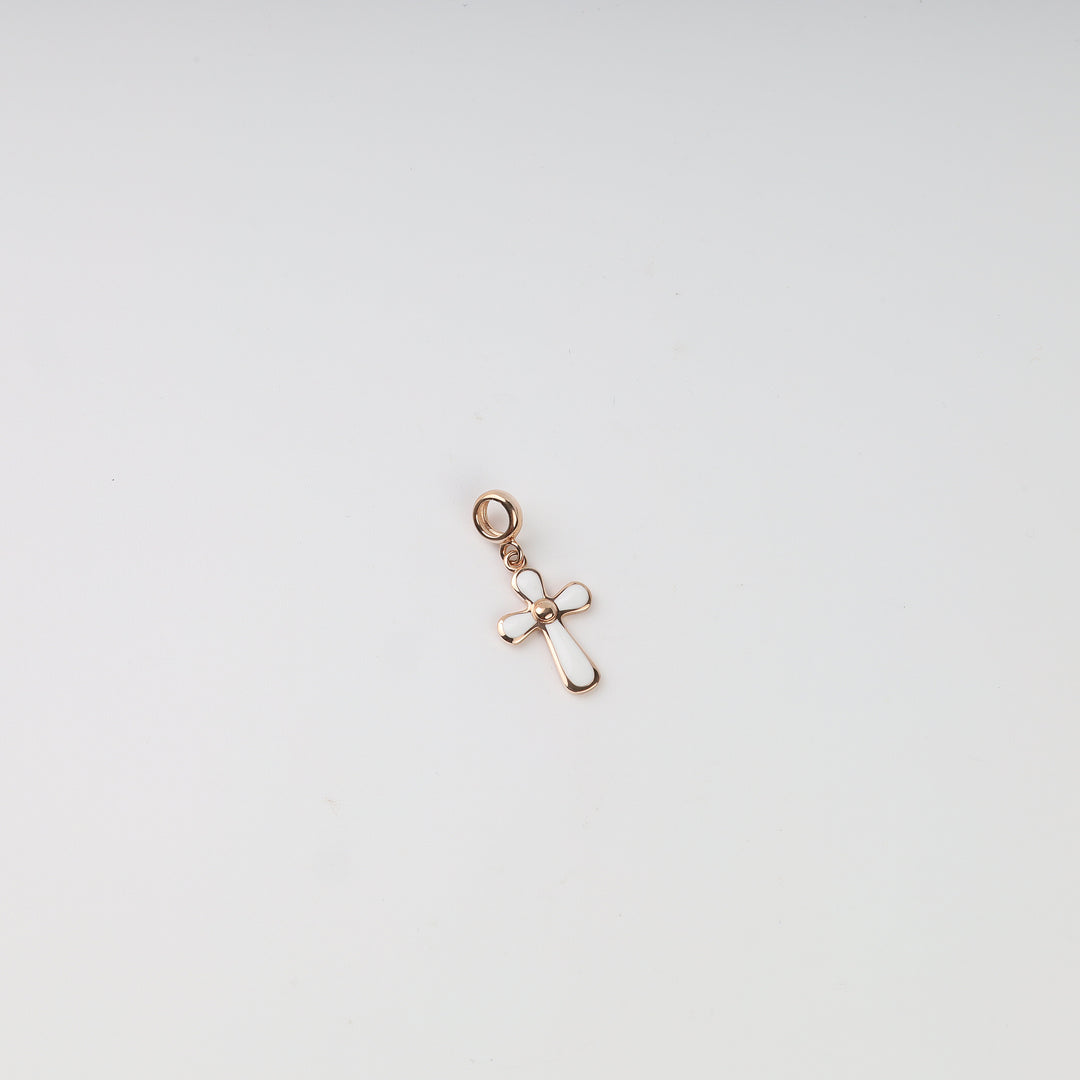 Rose gold white enamel cross pendant, angled view