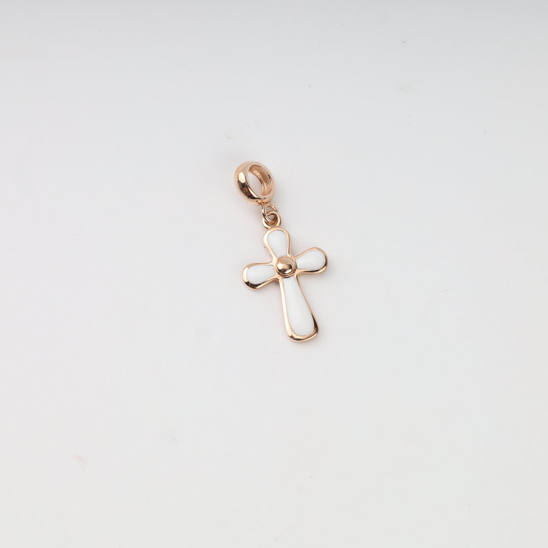 Rose gold cross pendant measured with a caliper