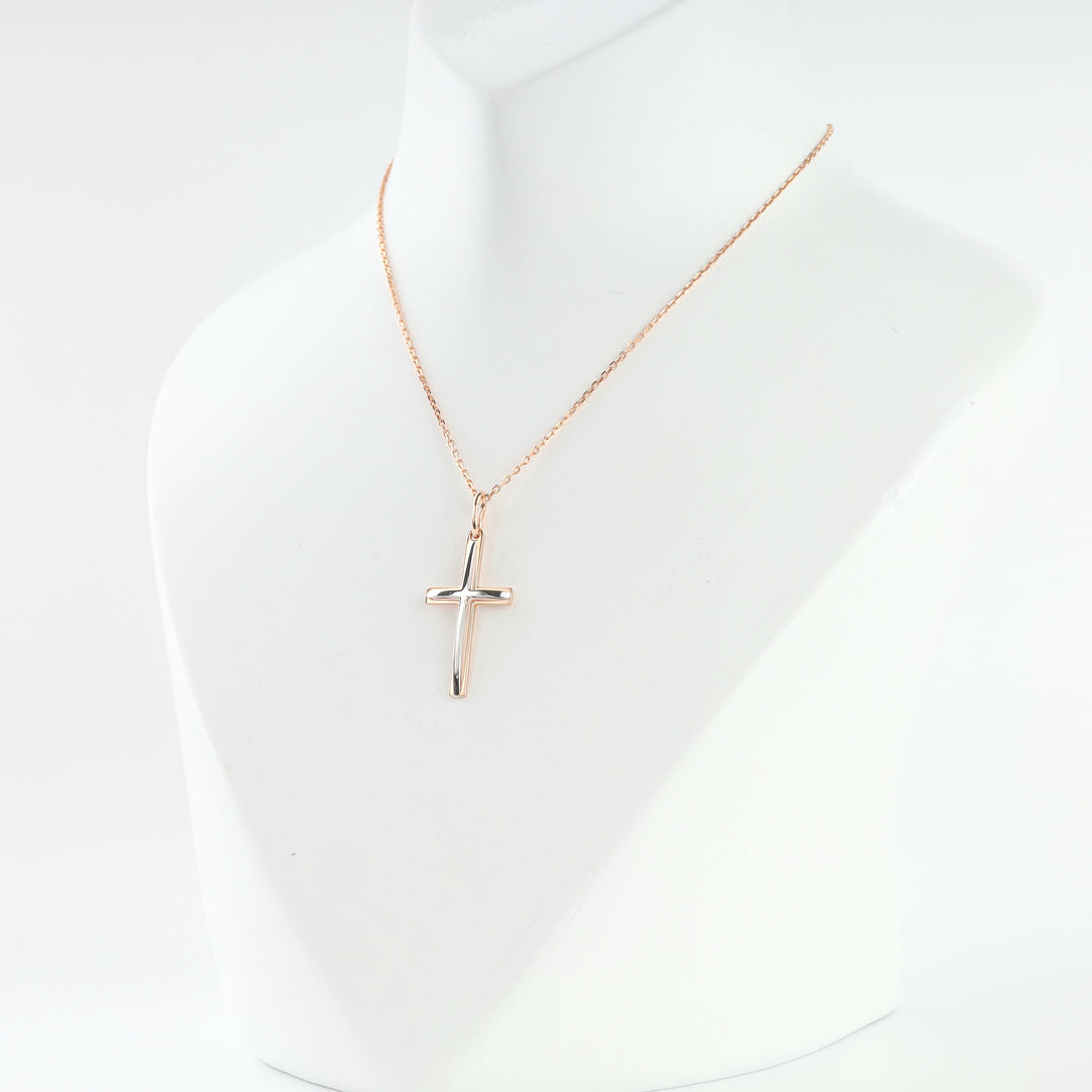 Two-tone gold cross pendant, polished, detail