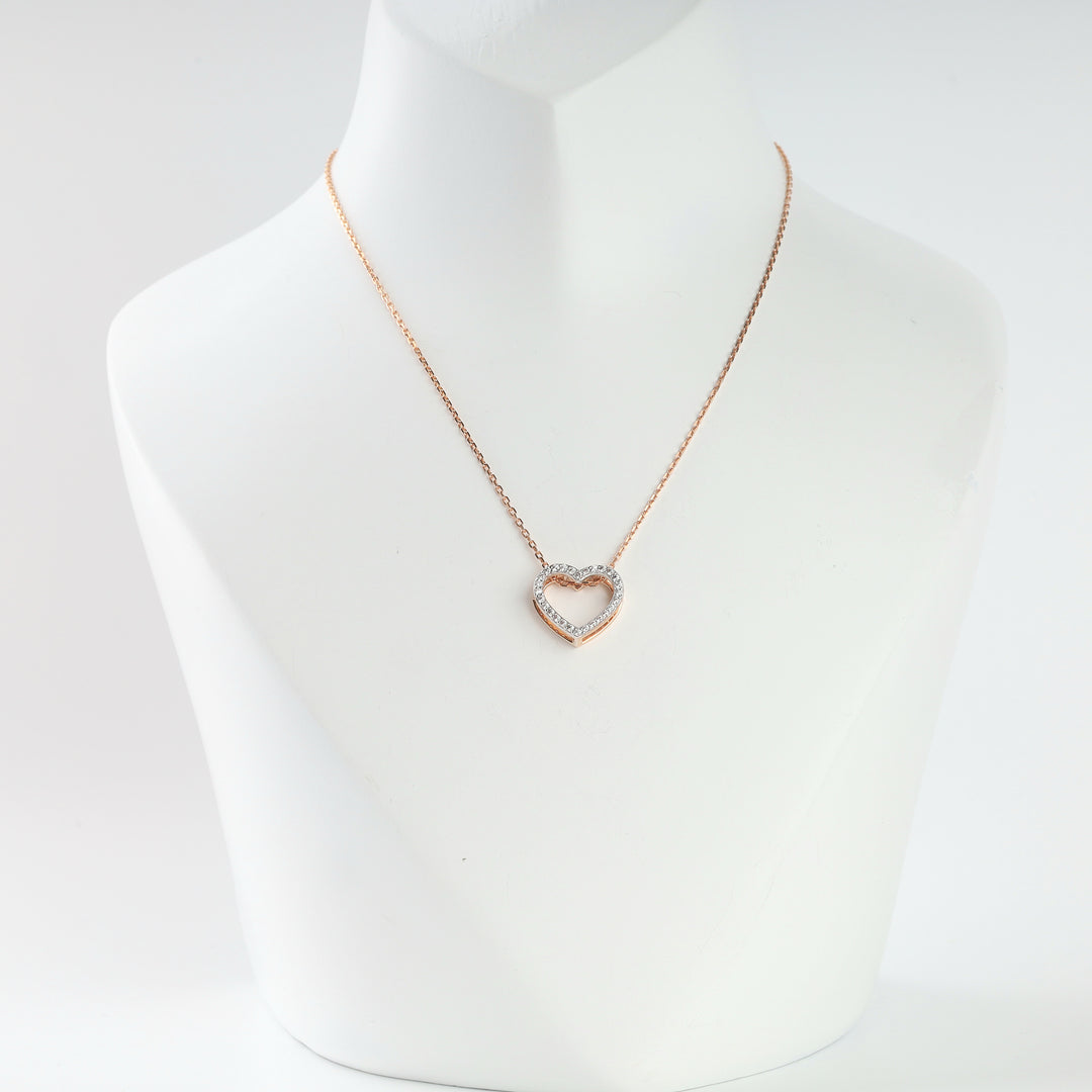 14K rose gold open heart pendant with cubic zirconia on a chain