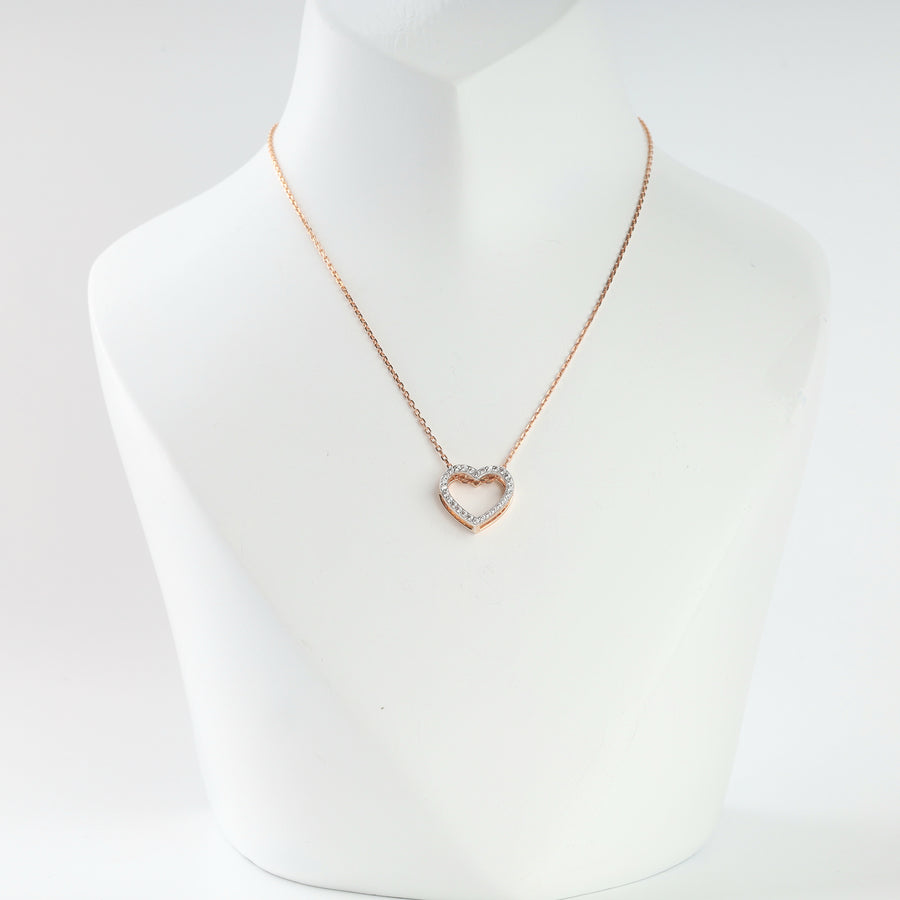 14K rose gold open heart pendant with cubic zirconia on a chain