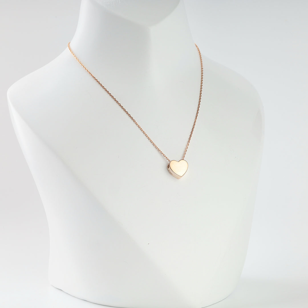 Polished rose gold puffed heart pendant, detail