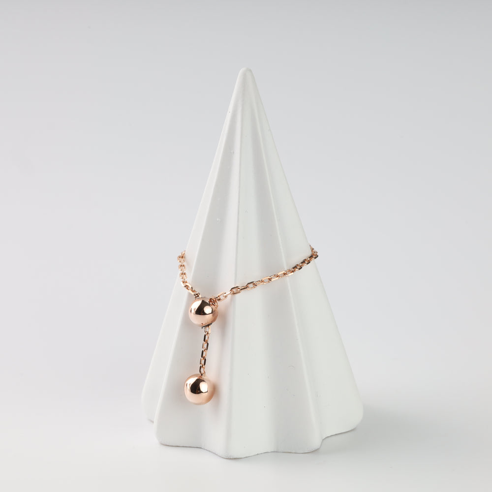 Rose gold chain ring with two polished ball details