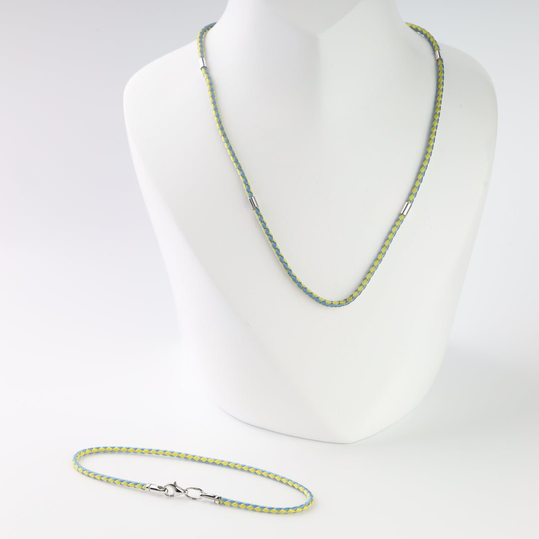 Blue and yellow Milan textile jewelry cord with polished silver accent stations