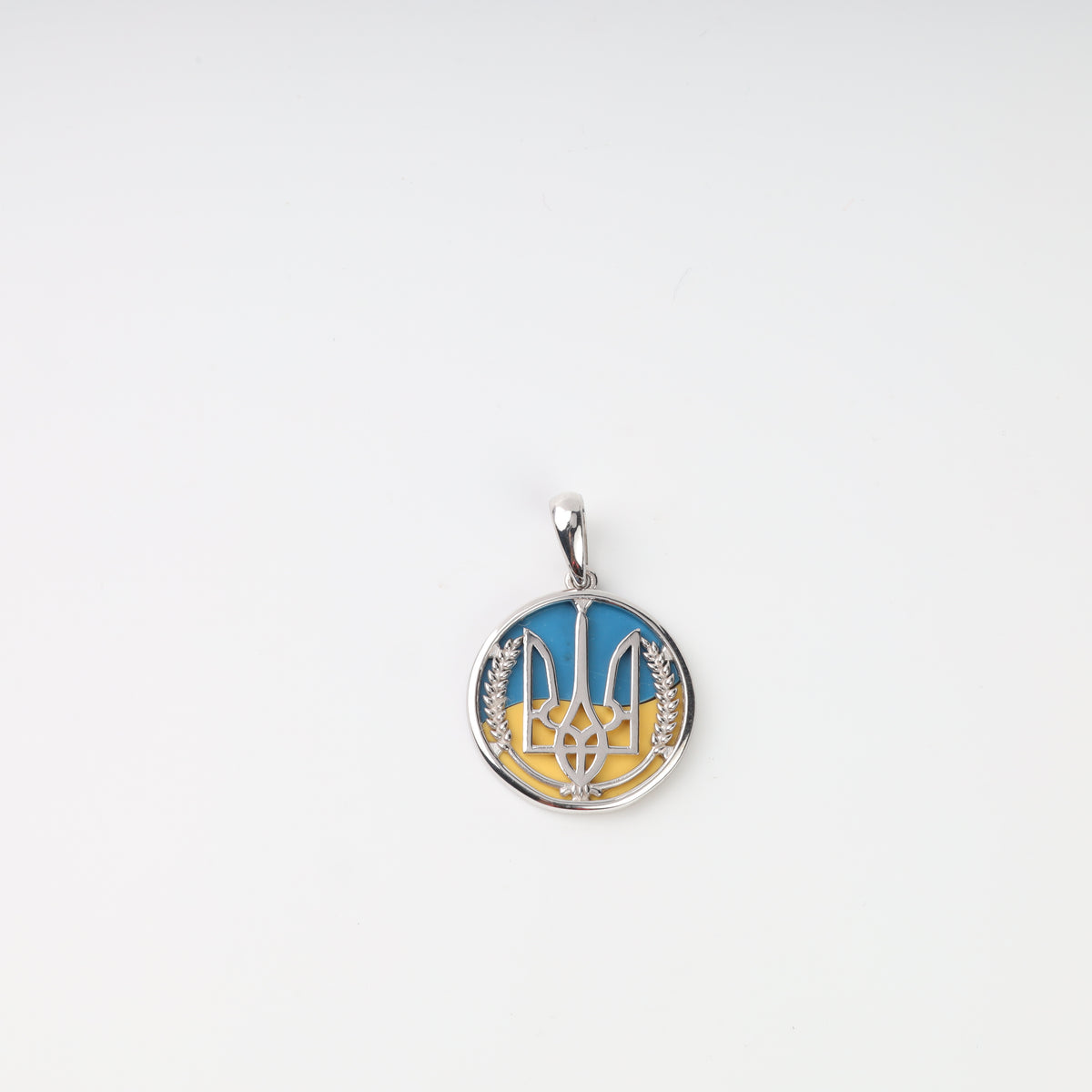 Reversible blue and yellow silver 925 Tryzub pendant, detailed front view