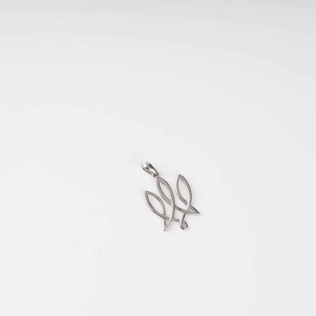 Angled view of the openwork construction and polished surface of the silver Tryzub pendant