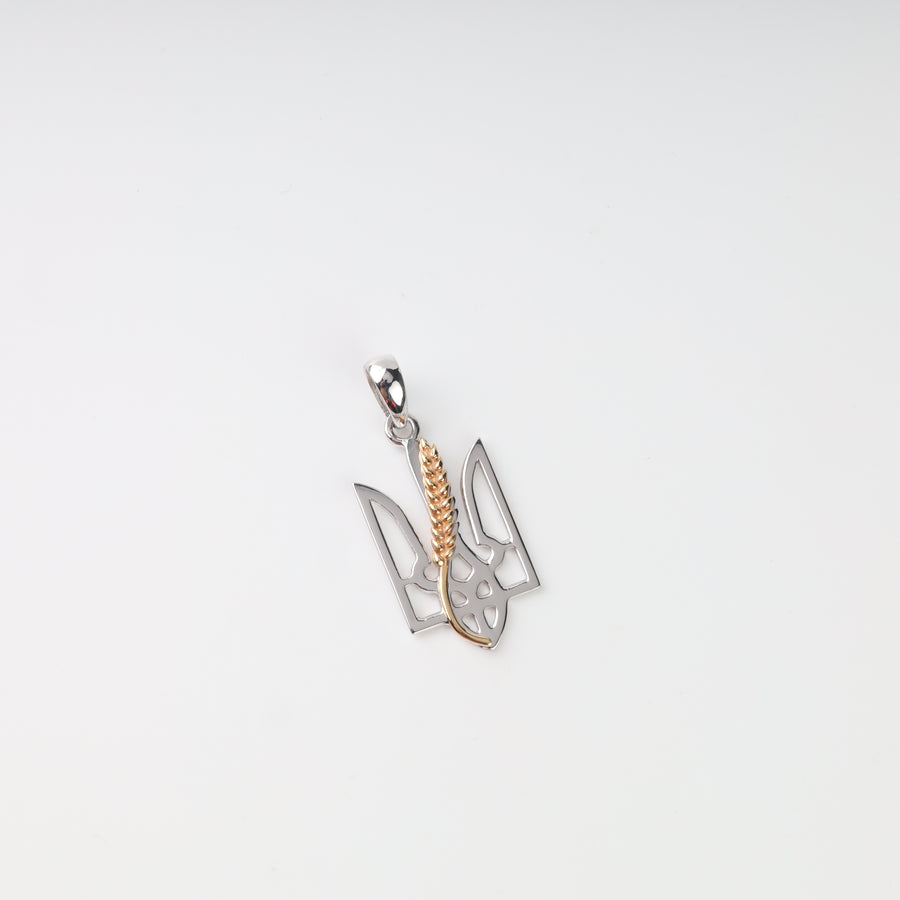 Front view of the silver 925 openwork Tryzub pendant with a raised gold-plated wheat ear