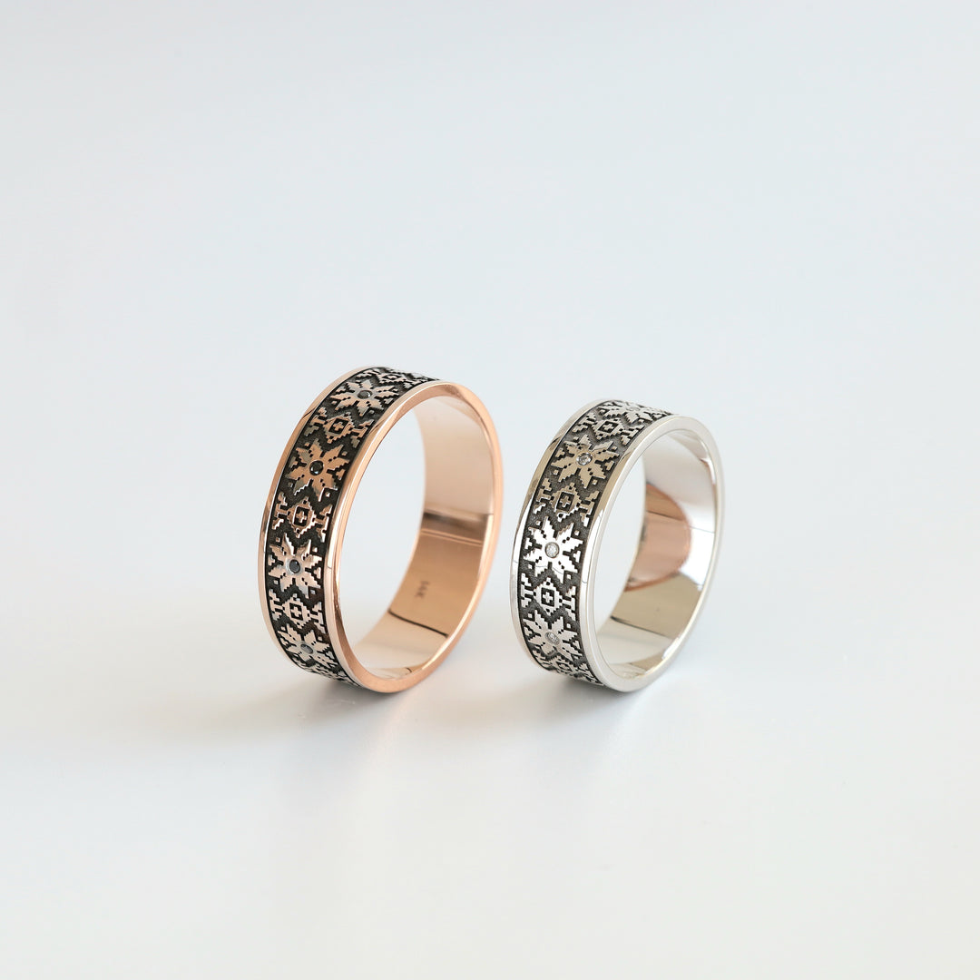 Pair of Ukrainian vyshyvanka wedding rings in rose and white gold with diamond accents