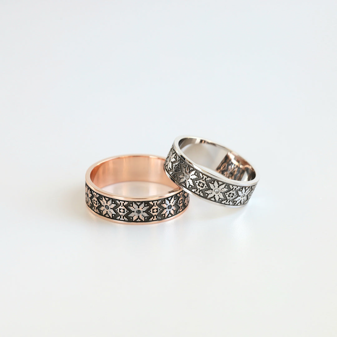 Pair of Ukrainian vyshyvanka wedding rings in white and rose gold with diamond accents