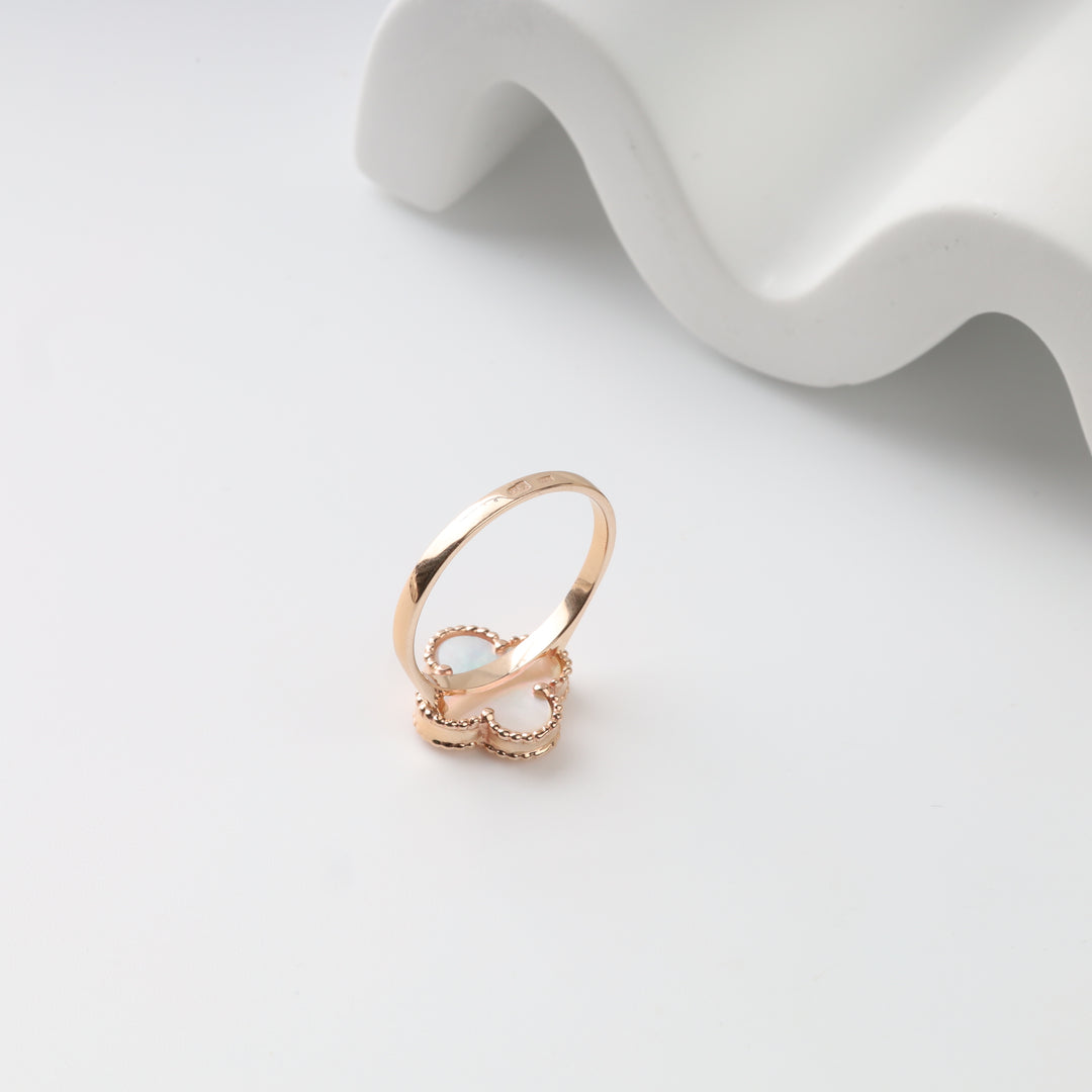 Back view of the 14K rose gold clover ring with polished band