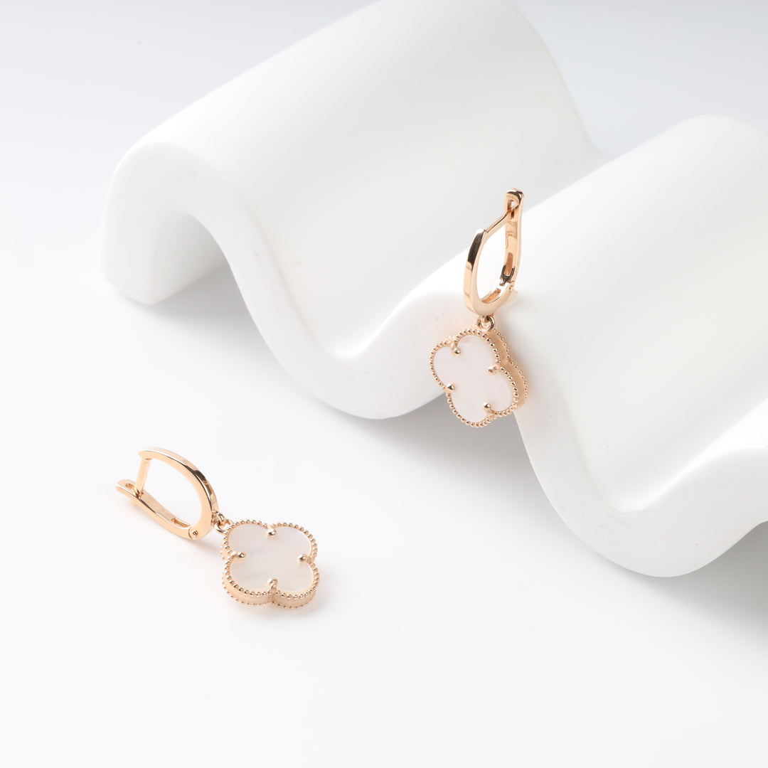 Pair of mother-of-pearl clover drop earrings with leverback closures