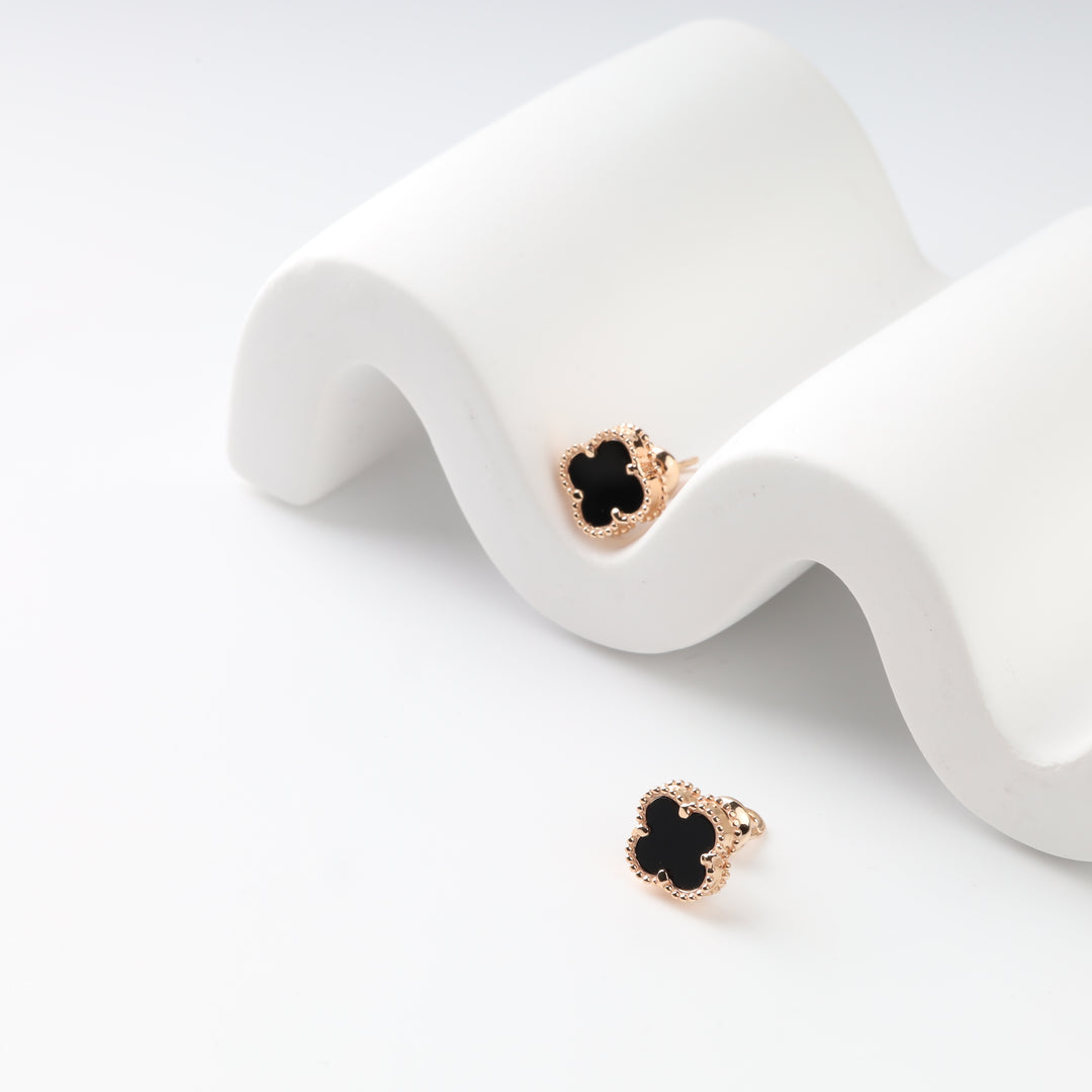 Black onyx four-leaf clover stud earrings in 14K rose gold, front view