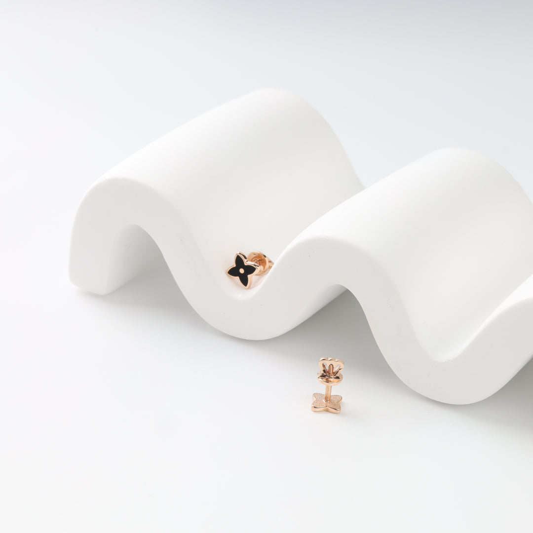 Rose gold screw-back stud earrings showing front and reverse