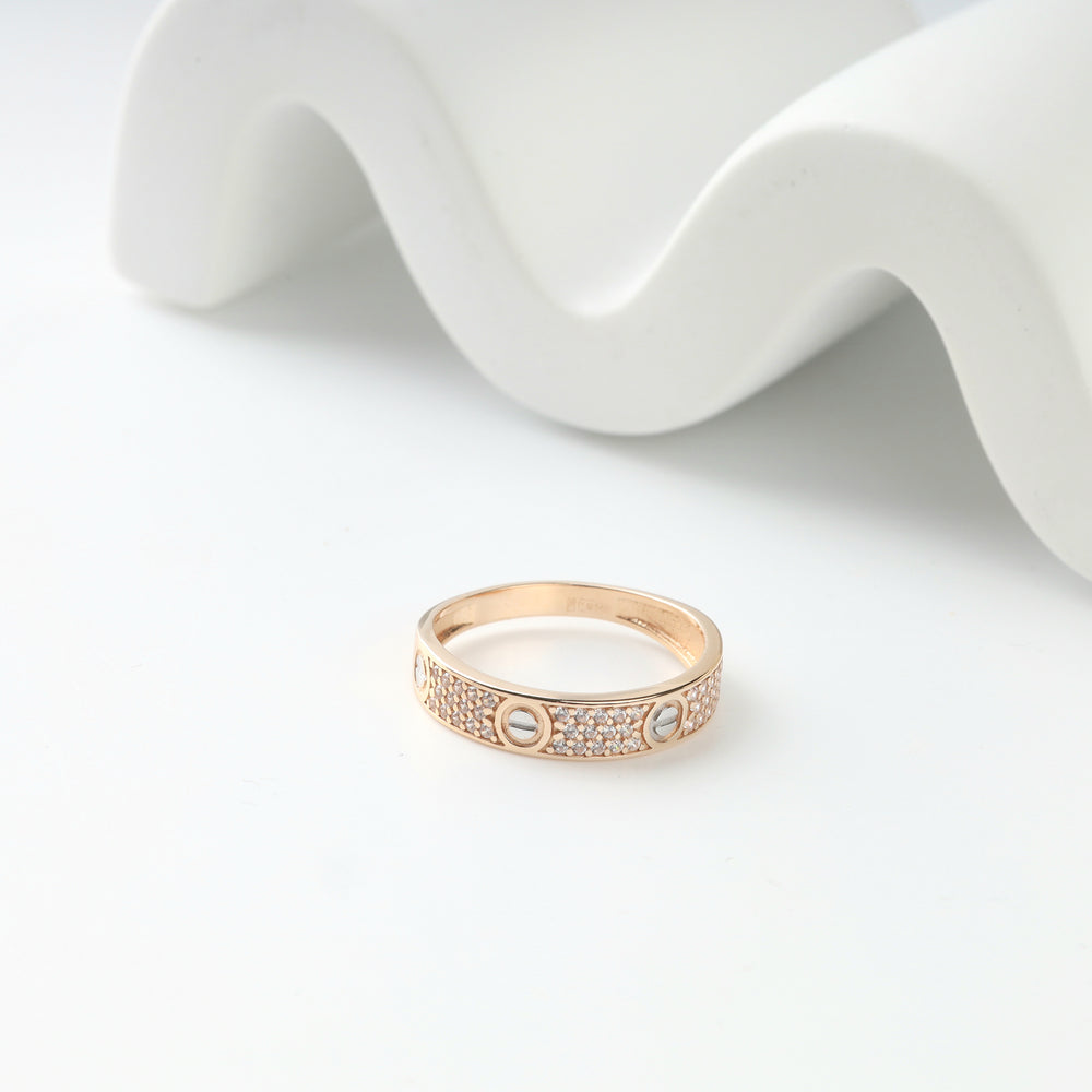 Rose gold pavé ring with round white accents, close view