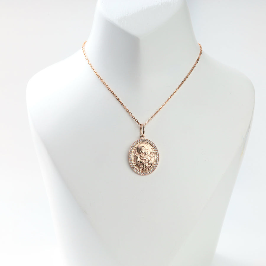Oval Virgin Mary and Child rose gold pendant with clear stone border