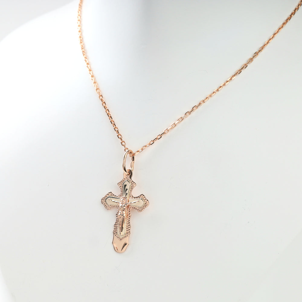 Caliper measuring ornate crucifix cross pendant at 29.32 millimeters
