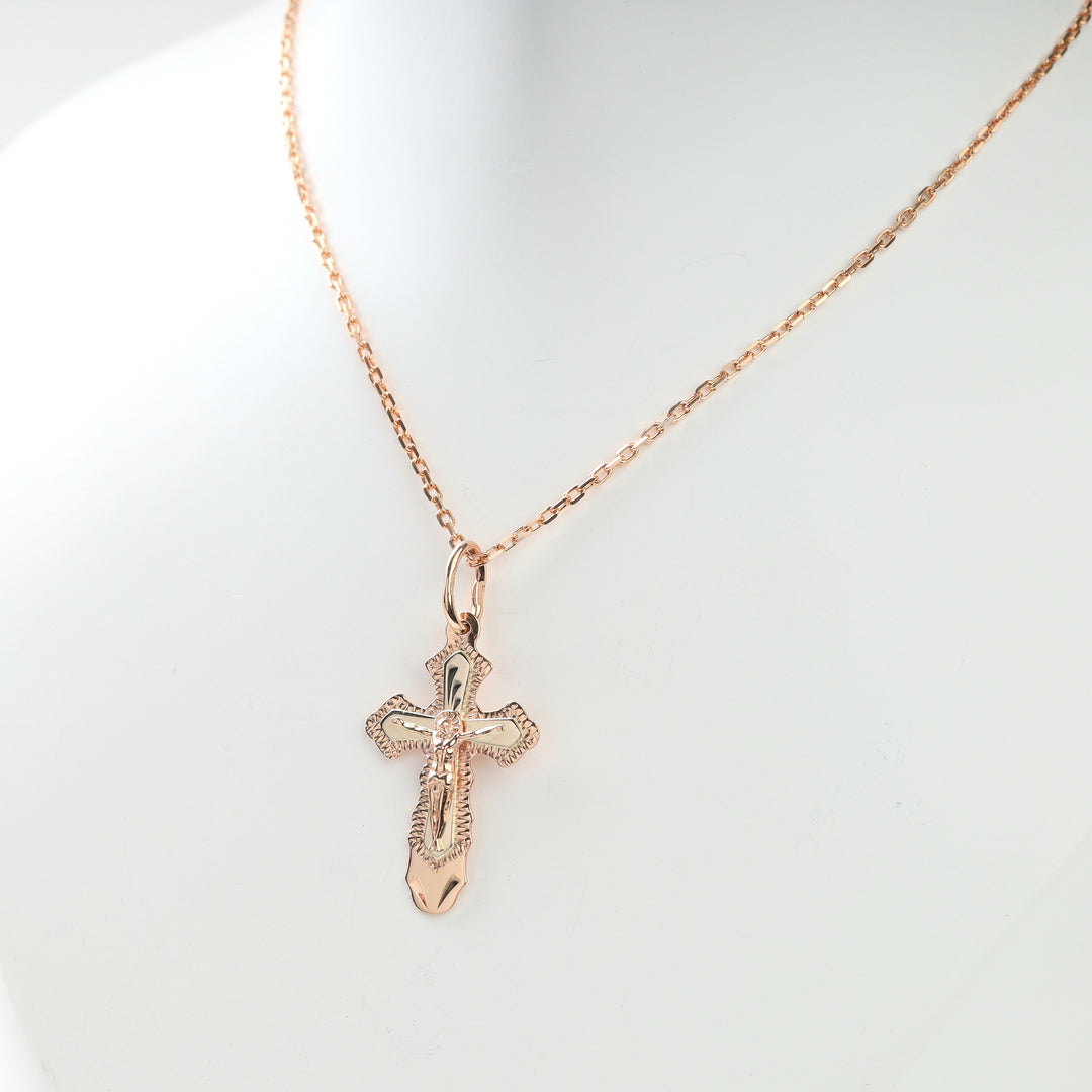 Caliper measuring ornate crucifix cross pendant at 29.32 millimeters