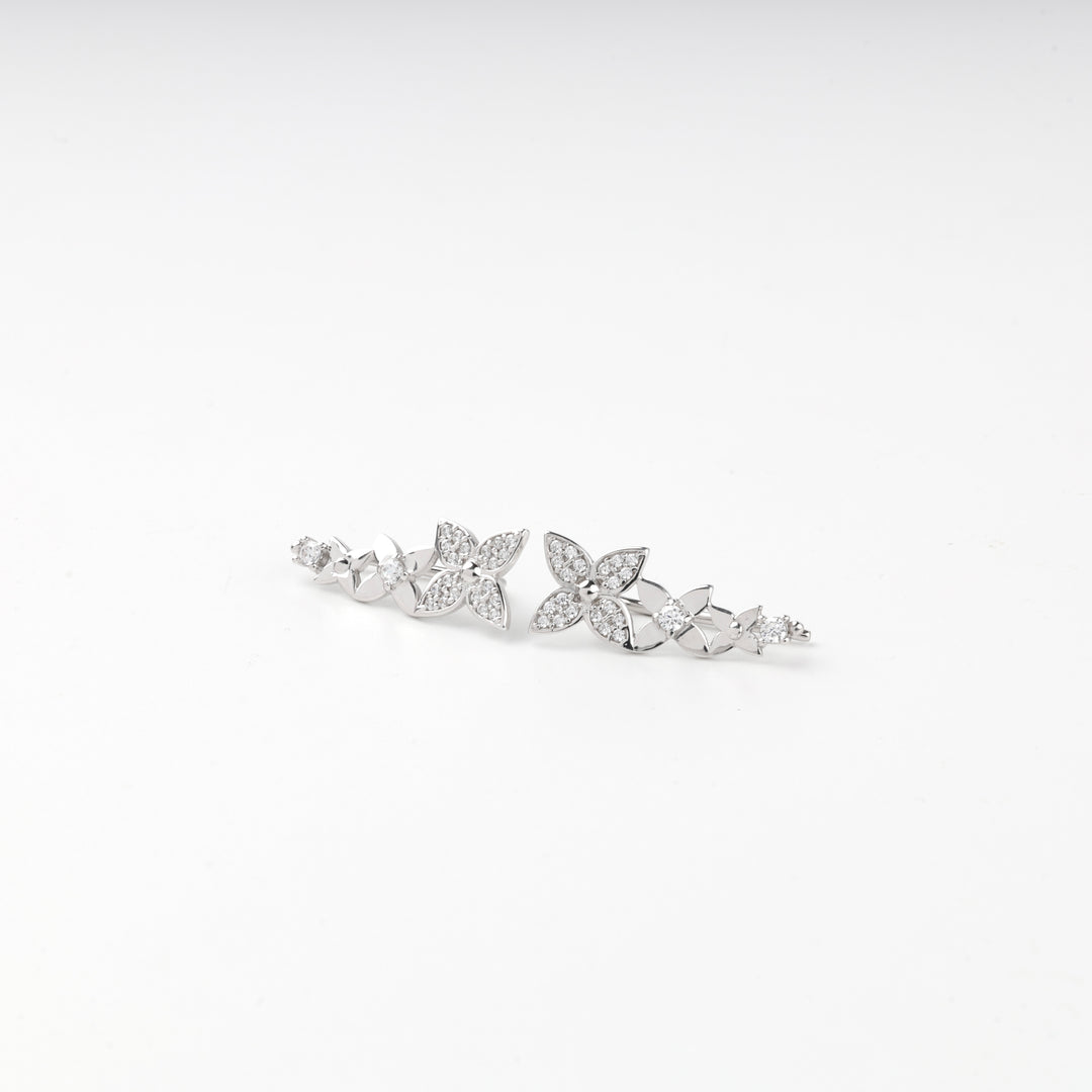 Graduated four petal flowers in silver 925 with pave cubic zirconia