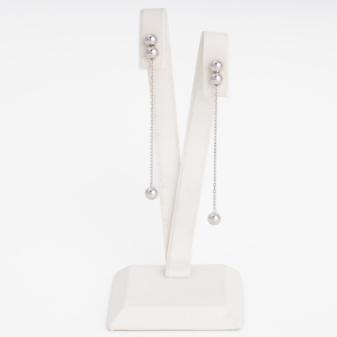 Drop earrings with silver balls on ear model, Sterling Silver 925 rhodium — Ukrainian Jewelry