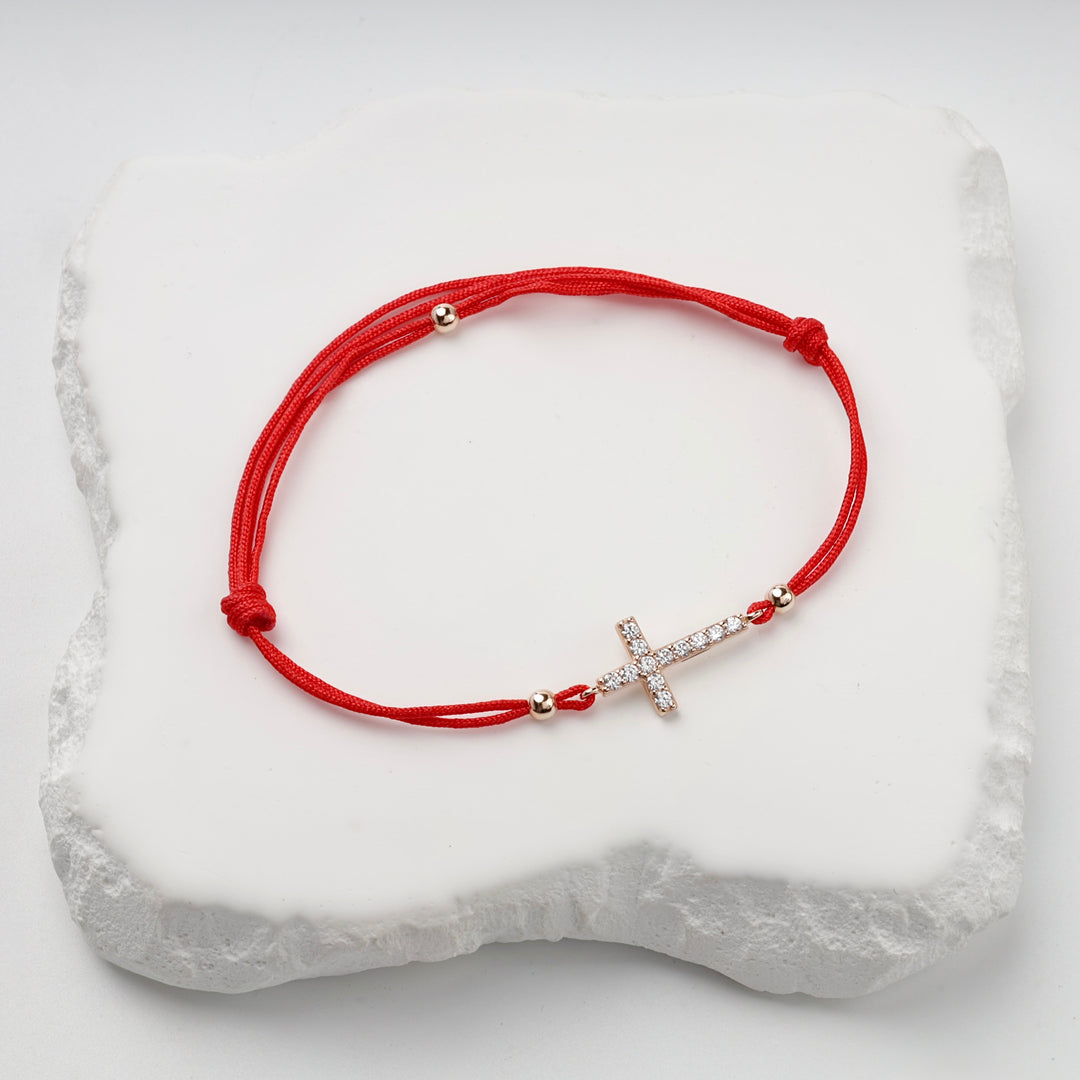 Red Cord Cross Bracelet with Cubic Zirconia | 14K Rose Gold (585) — scale view