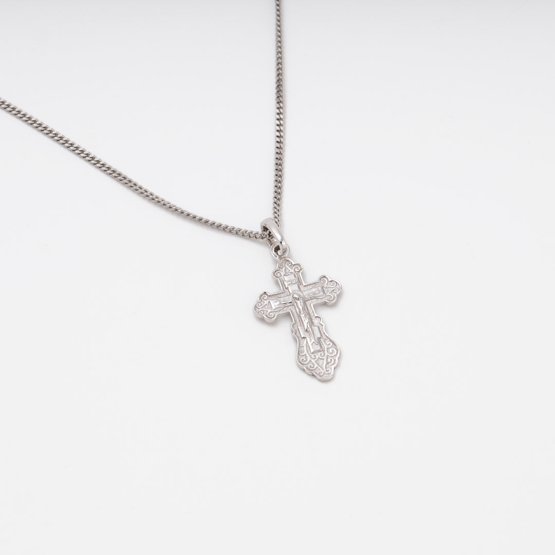 Orthodox Crucifix pendant close-up, scrollwork frame, Sterling Silver 925 — Ukrainian Jewelry