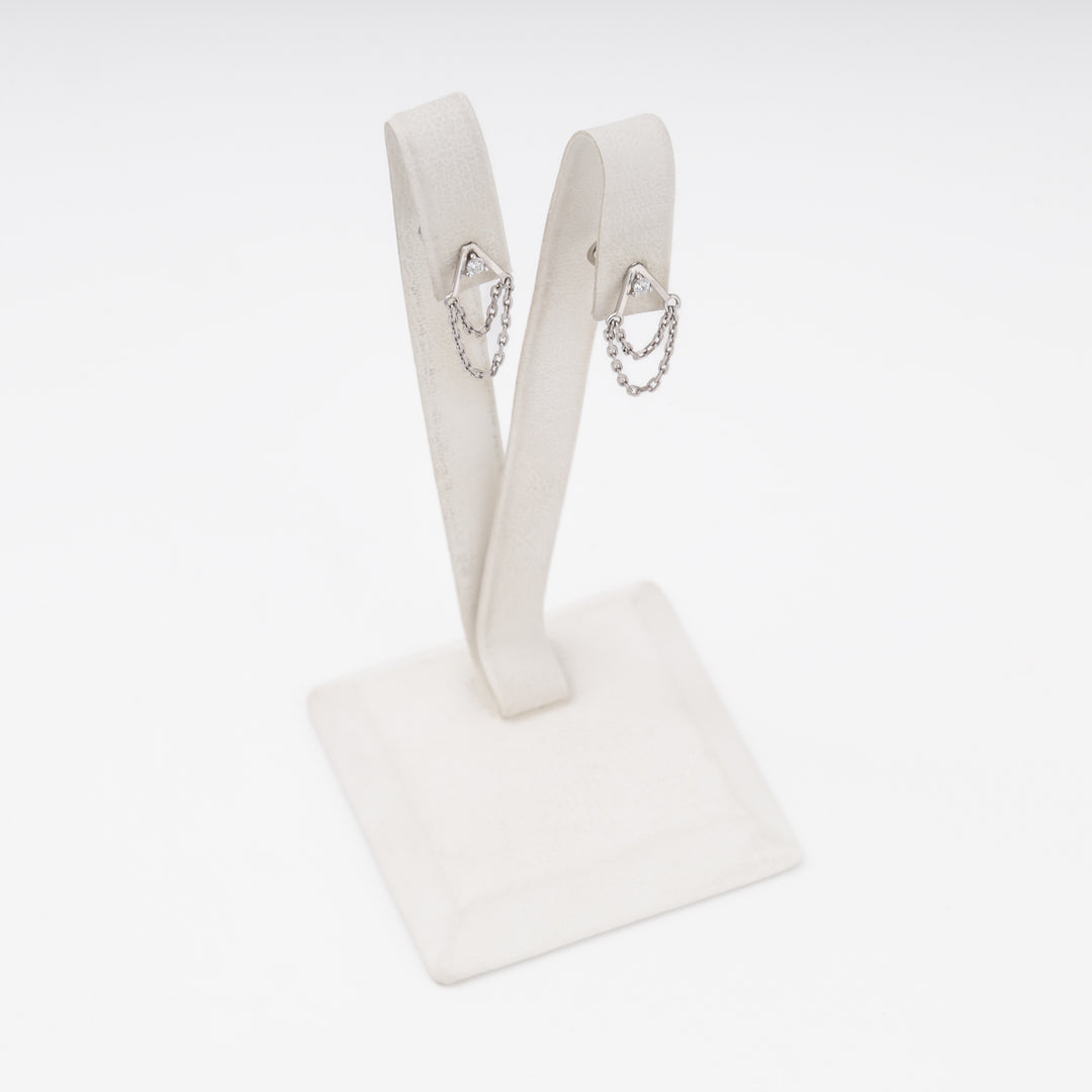 Drop earrings on display stand, silver rhodium chain design — Ukrainian Jewelry