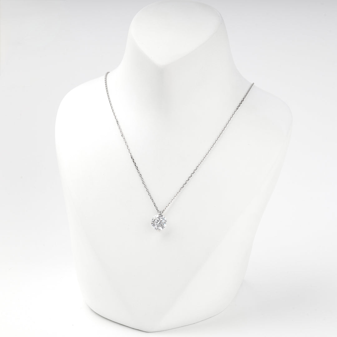 Silver 925 solitaire pendant necklace displayed on a white bust