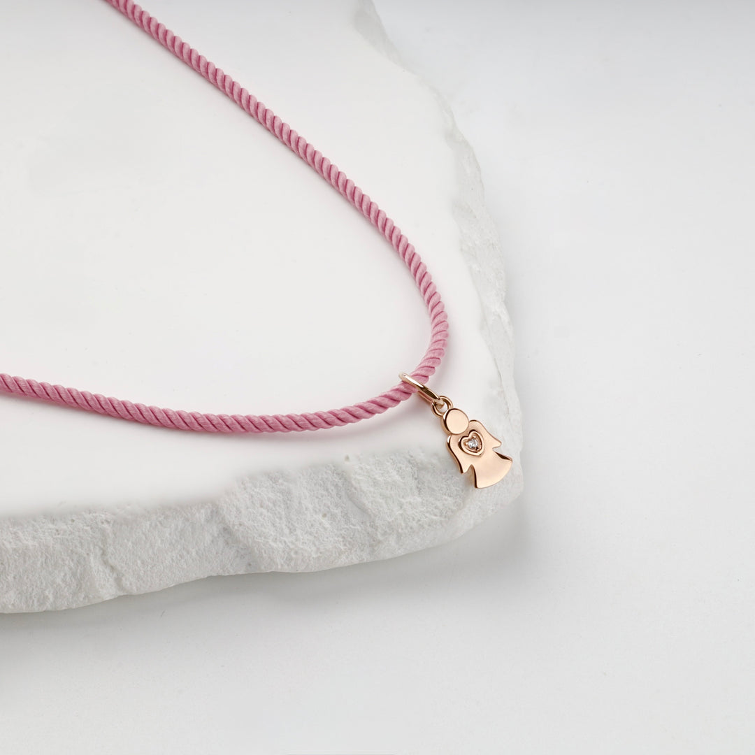 Small rose gold guardian angel pendant, studio view