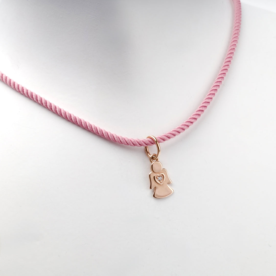 14K rose gold solid angel pendant, angled view