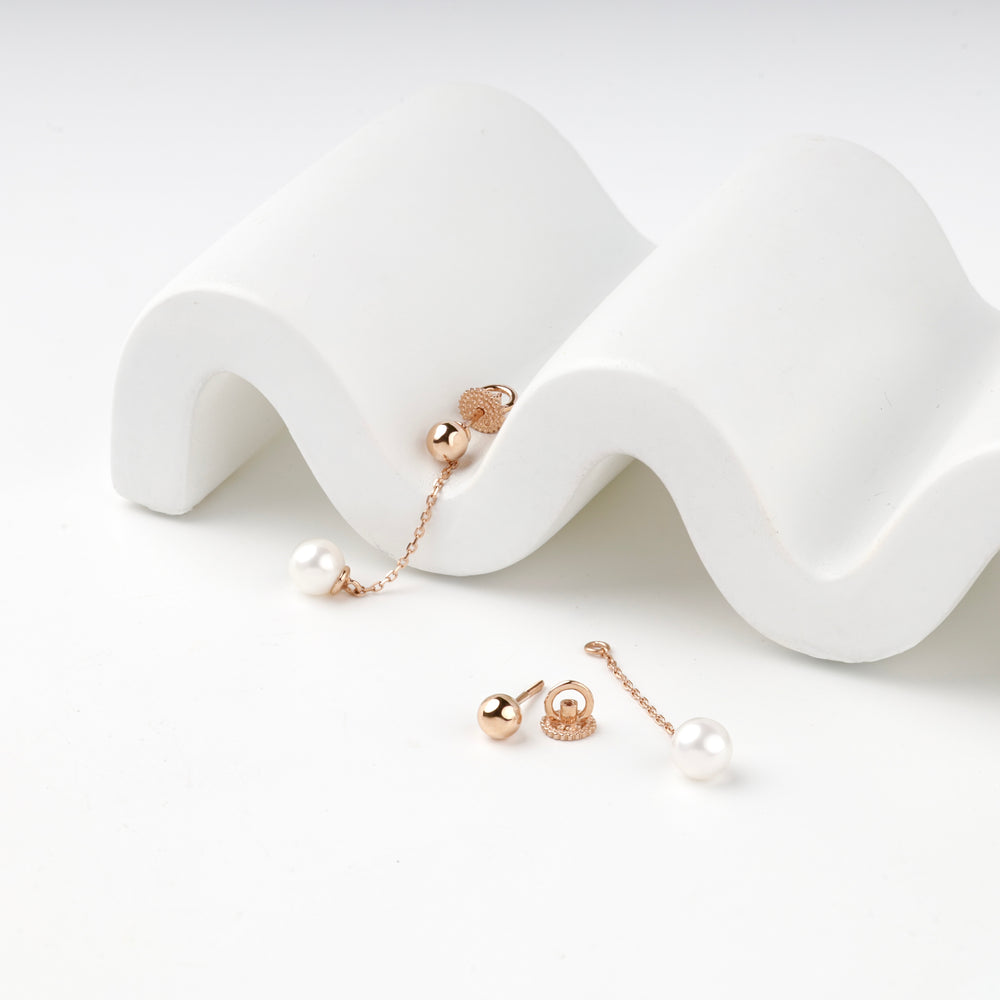 Rose gold 585 earring assembled and taken apart into ball stud, screw back and pearl drop