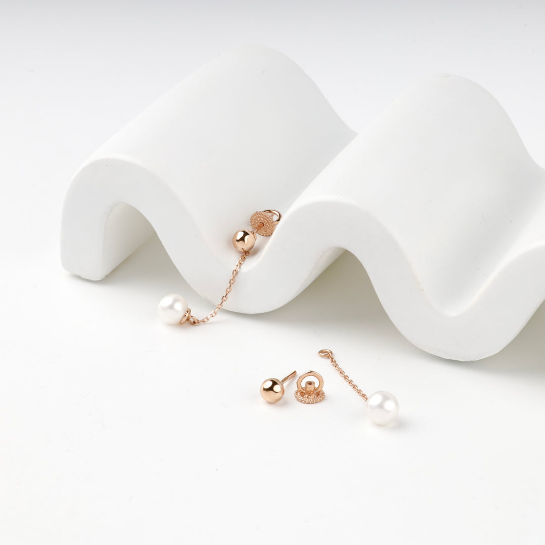 Rose gold 585 earring assembled and taken apart into ball stud, screw back and pearl drop