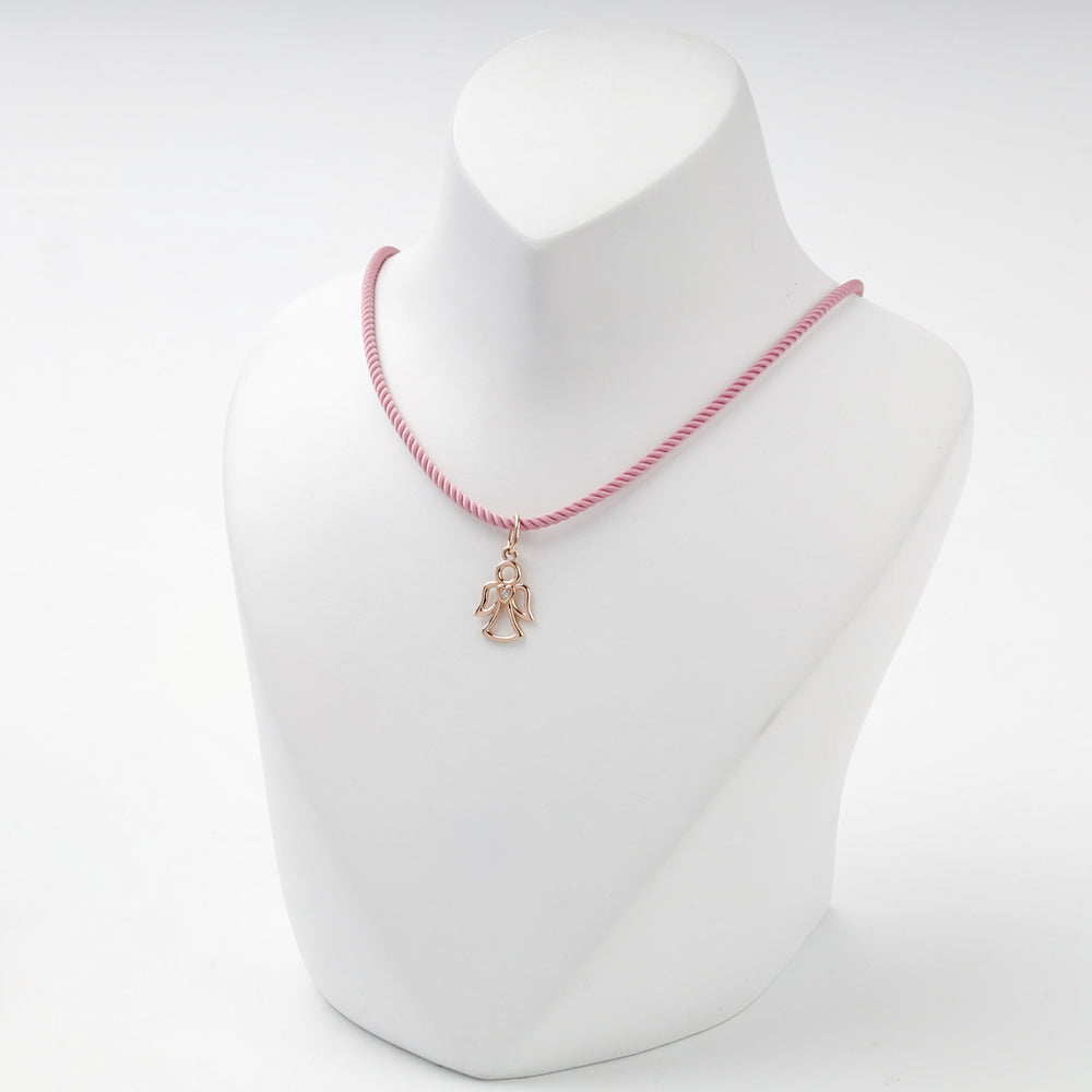 Rose gold openwork angel pendant with heart and cubic zirconia, overhead view