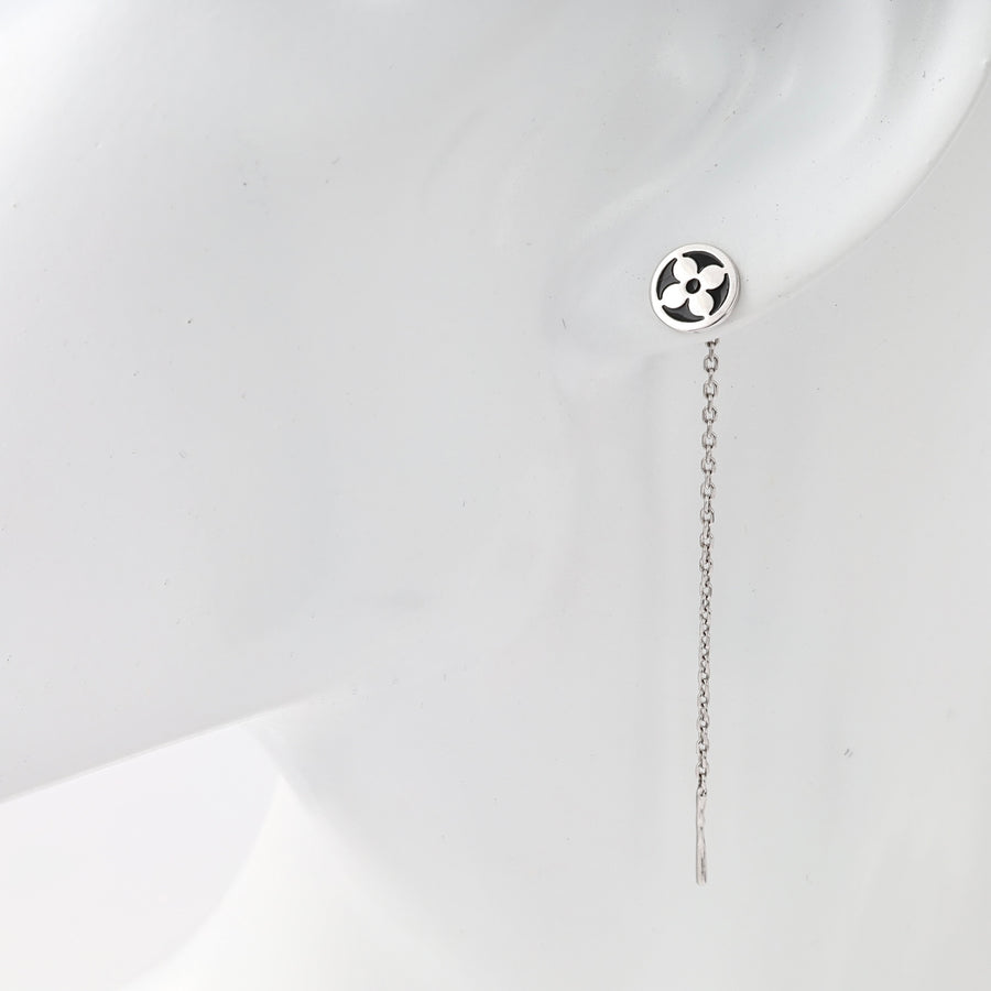Sterling silver long chain drop earring with round floral stud shown on ear, minimalist Ukrainian Jewelry for women.