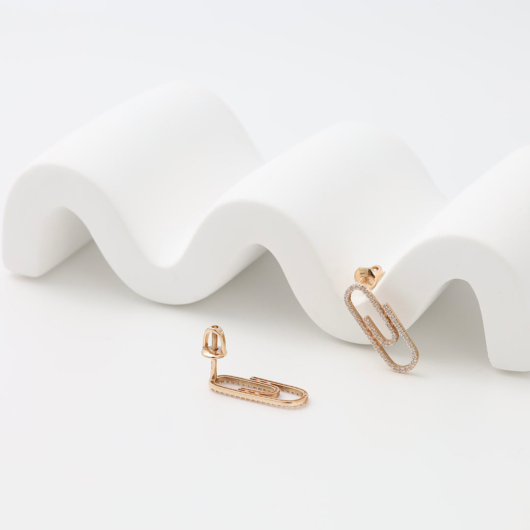 14k gold paperclip stud earrings with tiny crystals on white display, minimalist Ukrainian Jewelry, gold stud earrings gift.